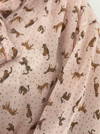 Blusa ampia fantasia con fiocco sul collo