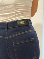 Denim a vita alta con strass