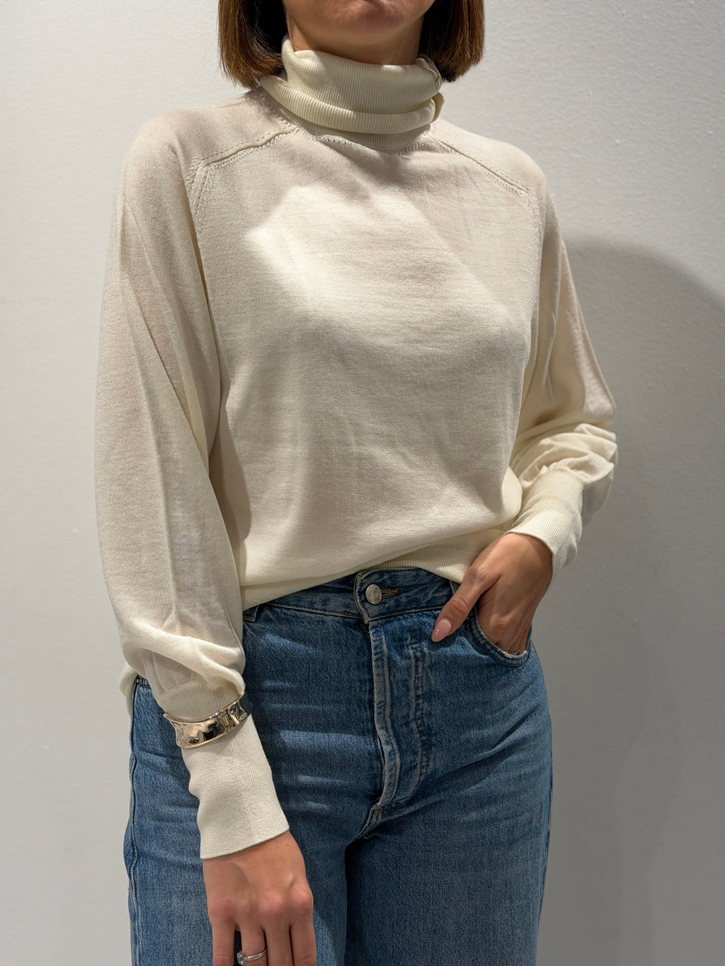 Dolcevita in lana con bracciale