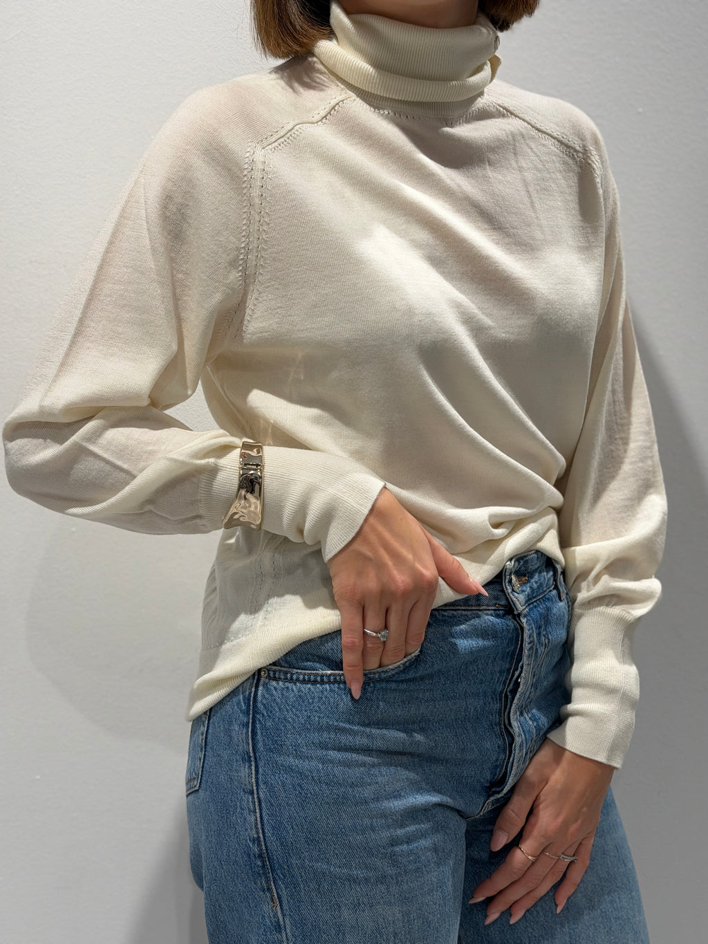 Dolcevita in lana con bracciale