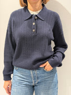 Polo in maglia con bottoni gioiello